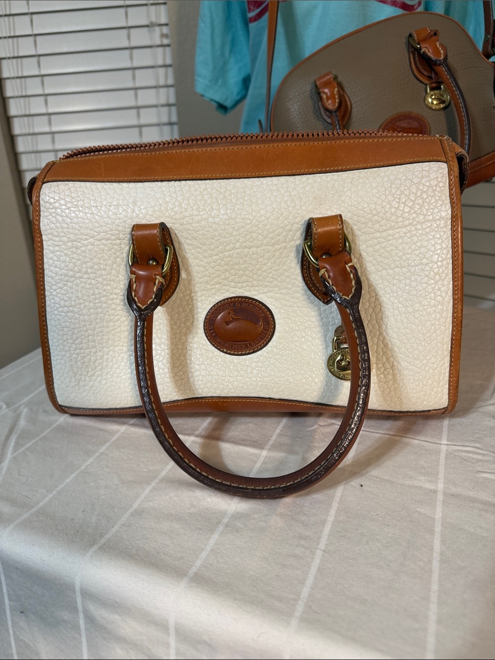 Dooney & Bourke Cream and Tan Leather Satchel Handbag, no strap